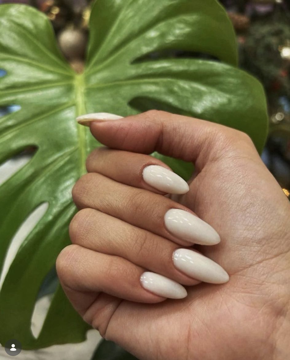 Glossy milky white almond gel manicure